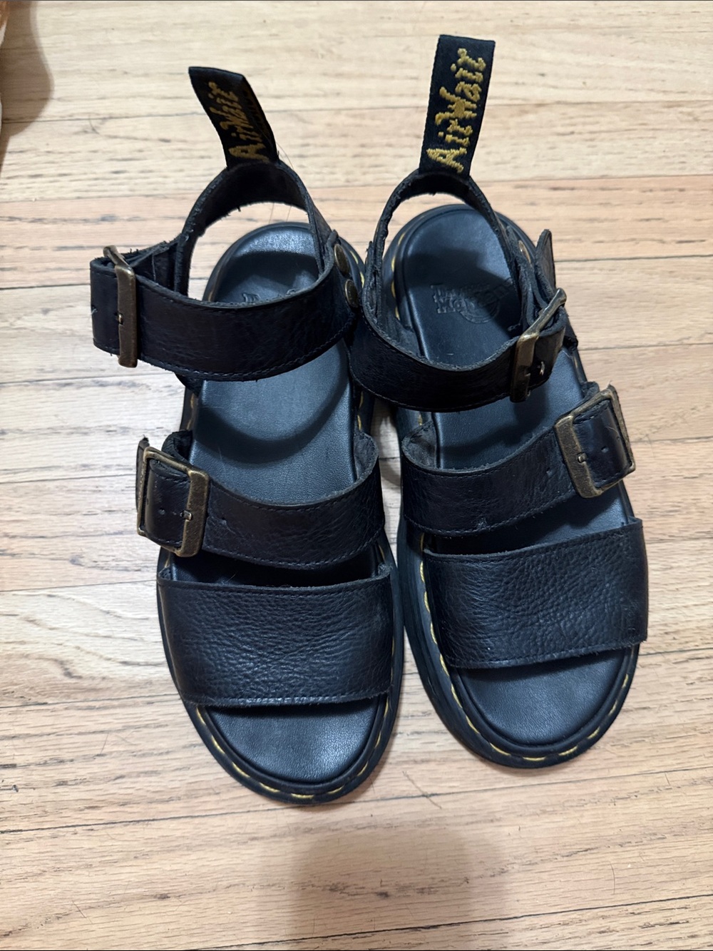 Dr. Martens Black Leather Triple-Strap Sandals with Yellow Stitching